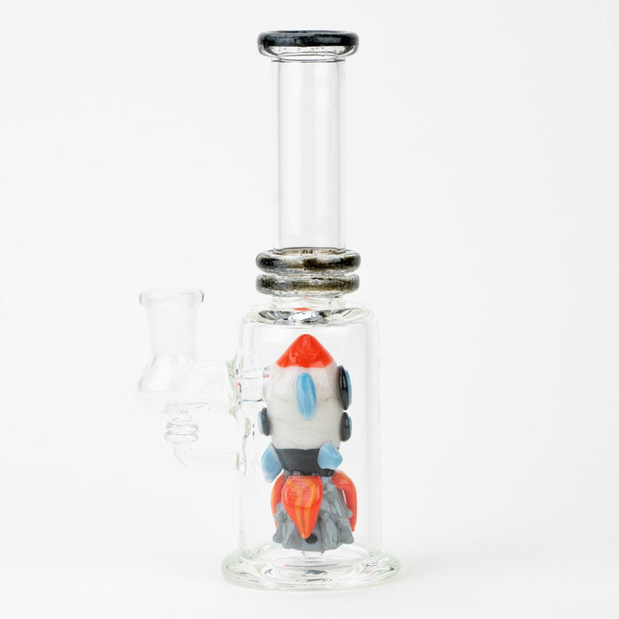 Empire Glassworks dab rig featuring a sculpted rocket ship inside the chamber