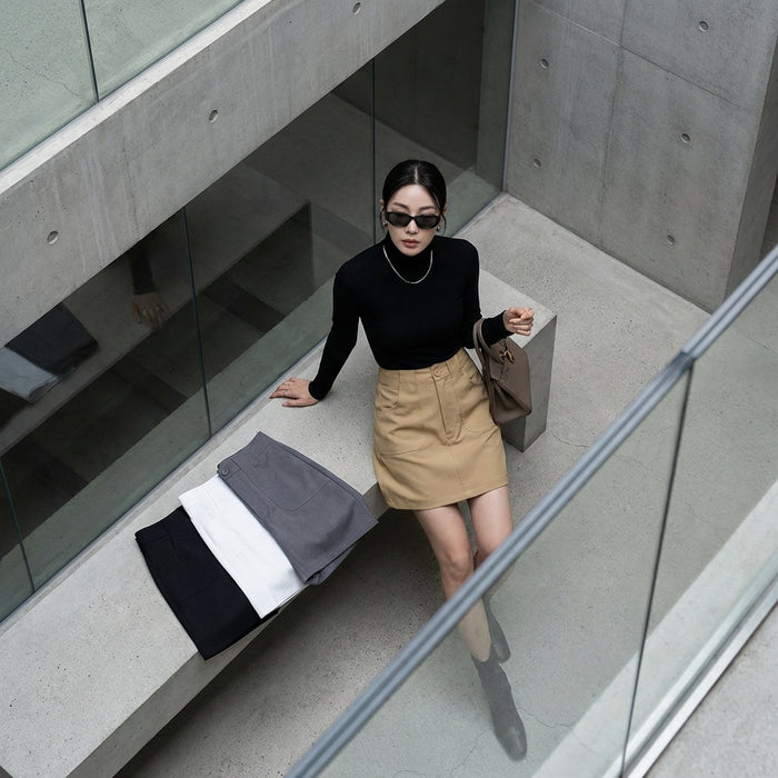 Jupe taille haute A-line noire, style mode coréenne, pour femme. Élégante et décontractée.