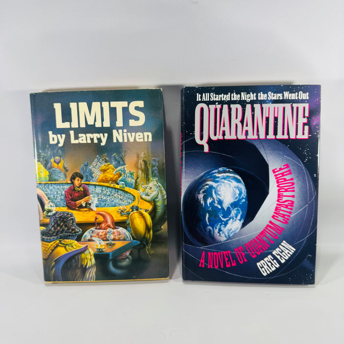 Two vintage science fiction hardcovers side by side—Limits by Larry Niven and Quarantine by Greg Egan—with colorful dust jackets and clean, bright interiors shown.